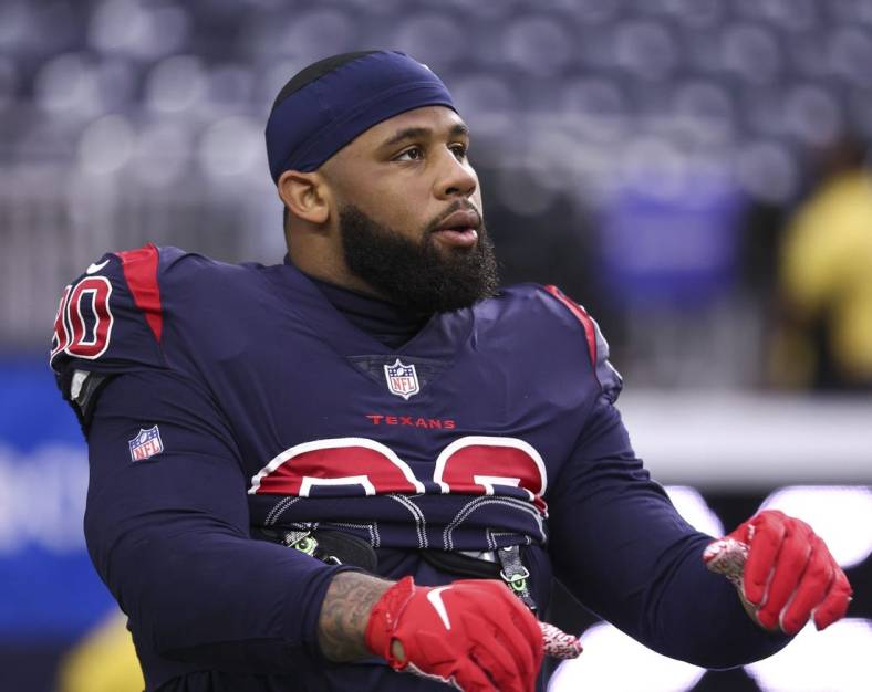 Dec 26, 2021; Houston, Texas, USA; Houston Texans defensive tackle Ross Blacklock (90) warms up before the game against the Los Angeles Chargers at NRG Stadium. Mandatory Credit: Troy Taormina-USA TODAY Sports