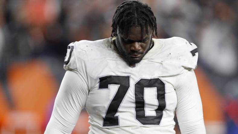 Jan 15, 2022; Cincinnati, Ohio, USA; Las Vegas Raiders guard Alex Leatherwood (70) reacts after their loss against the Cincinnati Bengals in an AFC Wild Card playoff football game at Paul Brown Stadium. Mandatory Credit: Joseph Maiorana-USA TODAY Sports