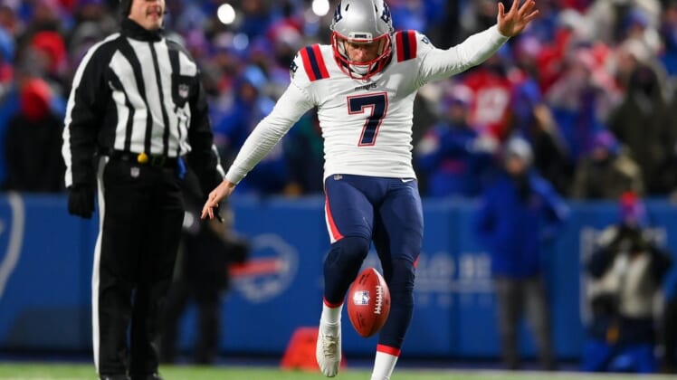Jan 15, 2022; Orchard Park, New York, USA; New England Patriots punter Jake Bailey (7) punts the ball during the first half against the Buffalo Bills in an AFC Wild Card playoff football game at Highmark Stadium. Mandatory Credit: Rich Barnes-USA TODAY Sports