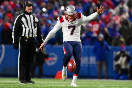 Jan 15, 2022; Orchard Park, New York, USA; New England Patriots punter Jake Bailey (7) punts the ball during the first half against the Buffalo Bills in an AFC Wild Card playoff football game at Highmark Stadium. Mandatory Credit: Rich Barnes-USA TODAY Sports