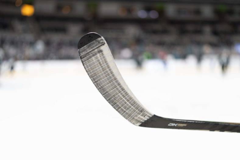 Jan 13, 2022; San Jose, California, USA;  General view of a hockey stick before the start of the first period between the San Jose Sharks and the New York Rangers at SAP Center at San Jose. Mandatory Credit: Stan Szeto-USA TODAY Sports