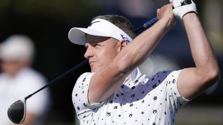 Feb 4, 2022; Pebble Beach, California, USA; Luke Donald plays his shot on the sixth tee during the second round of the AT&T Pebble Beach Pro-Am golf tournament at Pebble Beach Golf Links. Mandatory Credit: Ray Acevedo-USA TODAY Sports
