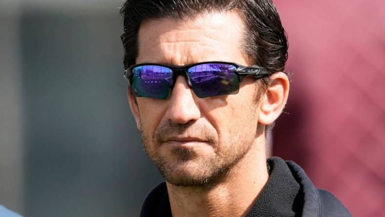 Feb 21, 2022; Scottsdale, Ariz., U.S.;  Diamondbacks general manager Mike Hazen watches a select training camp for minor-league players not covered by the Players Association at Salt River Fields. MLB continues to be in a lockout after the expiration of the collective bargaining agreement Dec. 2. Mandatory Credit: Michael Chow-Arizona Republic

Baseball Diamondbacks Select Minor League Camp