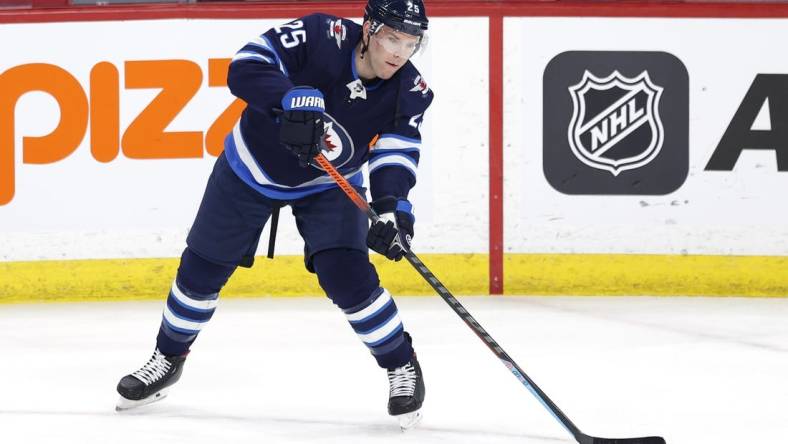 Mar 8, 2022; Winnipeg, Manitoba, CAN; Winnipeg Jets center Paul Stastny (25) warms up before a game against the Tampa Bay Lightning at Canada Life Centre. Mandatory Credit: James Carey Lauder-USA TODAY Sports