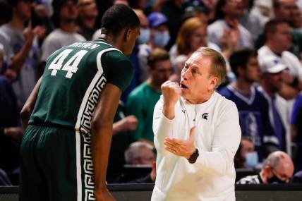 Michigan State coach Tom Izzo talks to forward Gabe Brown during the second half of MSU's 85-76 loss in the second round of the NCAA tournament on Sunday, March 20, 2022, in Greenville, South Carolina.