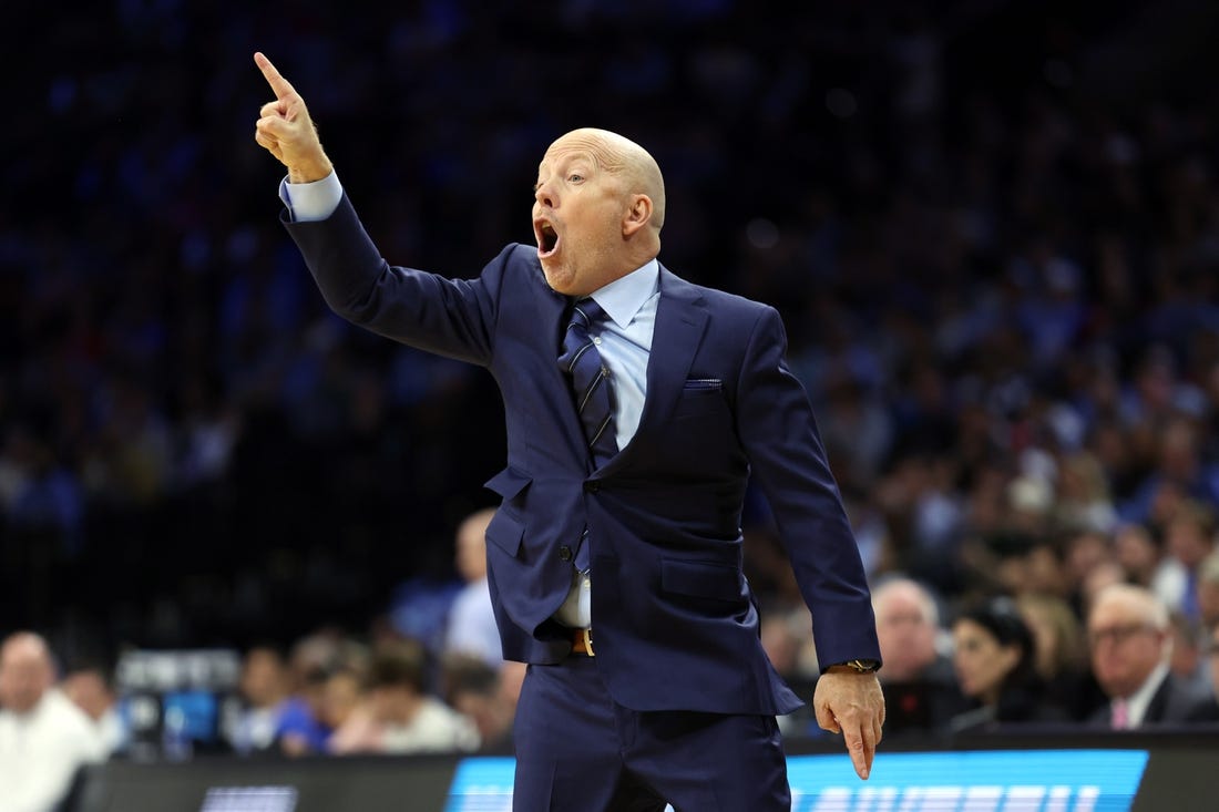 Mar 25, 2022; Philadelphia, PA, USA; UCLA Bruins head coach Mike Cronin reacts in the first half against the North Carolina Tar Heels in the semifinals of the East regional of the men's college basketball NCAA Tournament at Wells Fargo Center. Mandatory Credit: Bill Streicher-USA TODAY Sports