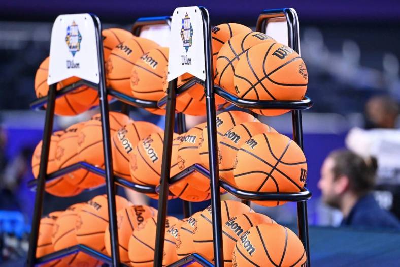 Apr 1, 2022; New Orleans, LA, USA; A detail view of basketballs on the on a rack during a practice session before the 2022 NCAA men's basketball tournament Final Four semifinals at Caesars Superdome. Mandatory Credit: Bob Donnan-USA TODAY Sports