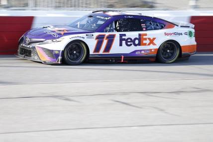 Apr 3, 2022; Richmond, Virginia, USA; NASCAR Cup Series driver Denny Hamlin (11) races during the Toyota Owners 400 at Richmond International Raceway. Mandatory Credit: Amber Searls-USA TODAY Sports
