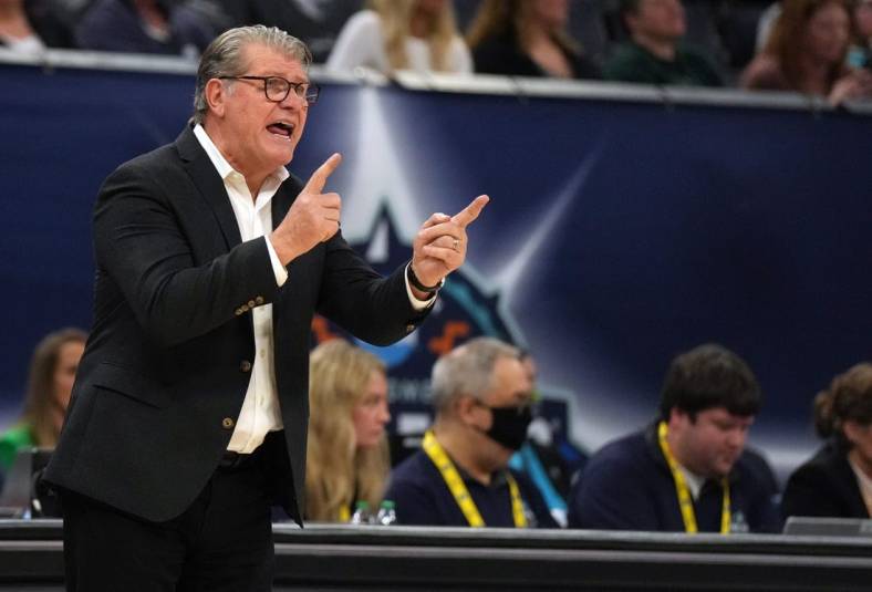 Apr 3, 2022; Minneapolis, MN, USA; UConn Huskies head coach Geno Auriemma shouts to his players during the first half against the South Carolina Gamecocks in the Final Four championship game of the women's college basketball NCAA Tournament at Target Center. Mandatory Credit: Kirby Lee-USA TODAY Sports