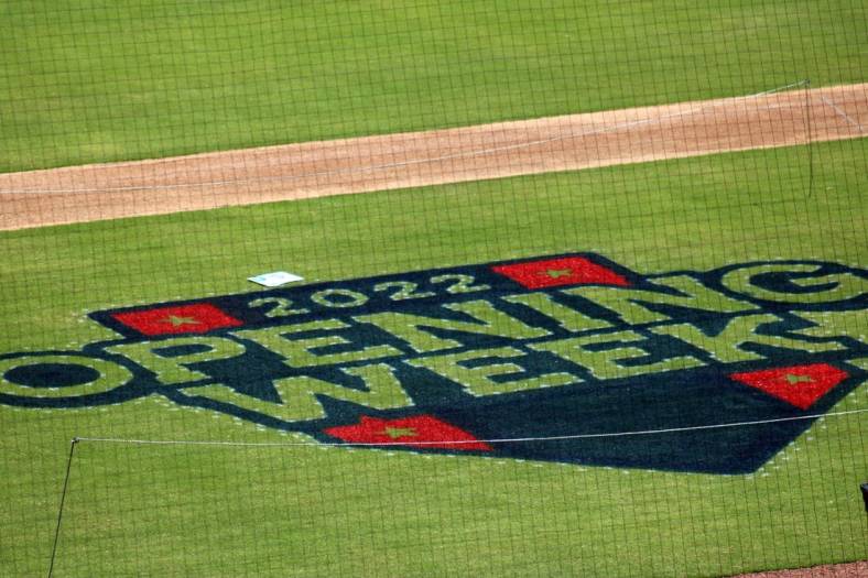 The Opening Week logo for minor league baseball is displayed on the 121 Financial Ballpark field for Jacksonville Jumbo Shrimp baseball media day on April 4, 2022. [Clayton Freeman/Florida Times-Union]