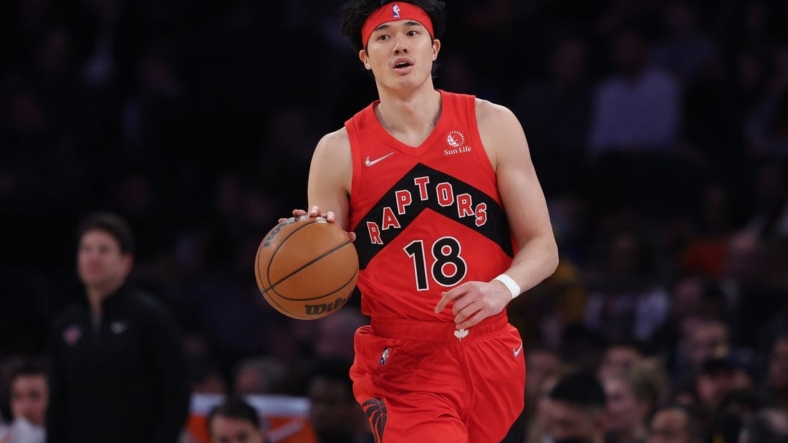 Apr 10, 2022; New York, New York, USA; Toronto Raptors forward Yuta Watanabe (18) dribbles up court  against the New York Knicks during the first half at Madison Square Garden. Mandatory Credit: Vincent Carchietta-USA TODAY Sports
