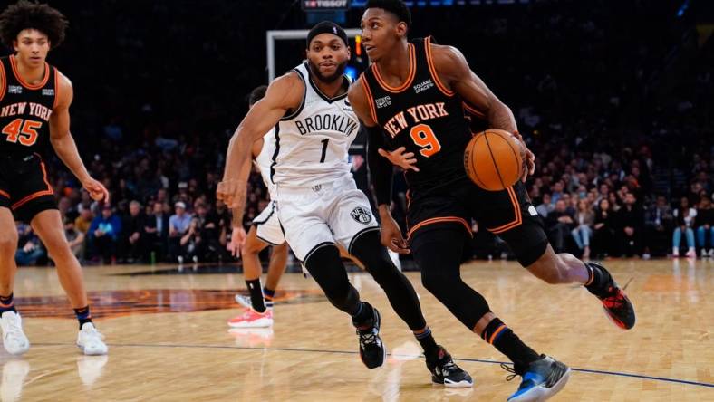 Apr 6, 2022; New York, New York, USA; New York Knicks shooting guard RJ Barrett (9) dribbles the ball against Brooklyn Nets small forward Bruce Brown (1) during the second half at Madison Square Garden. Mandatory Credit: Gregory Fisher-USA TODAY Sports