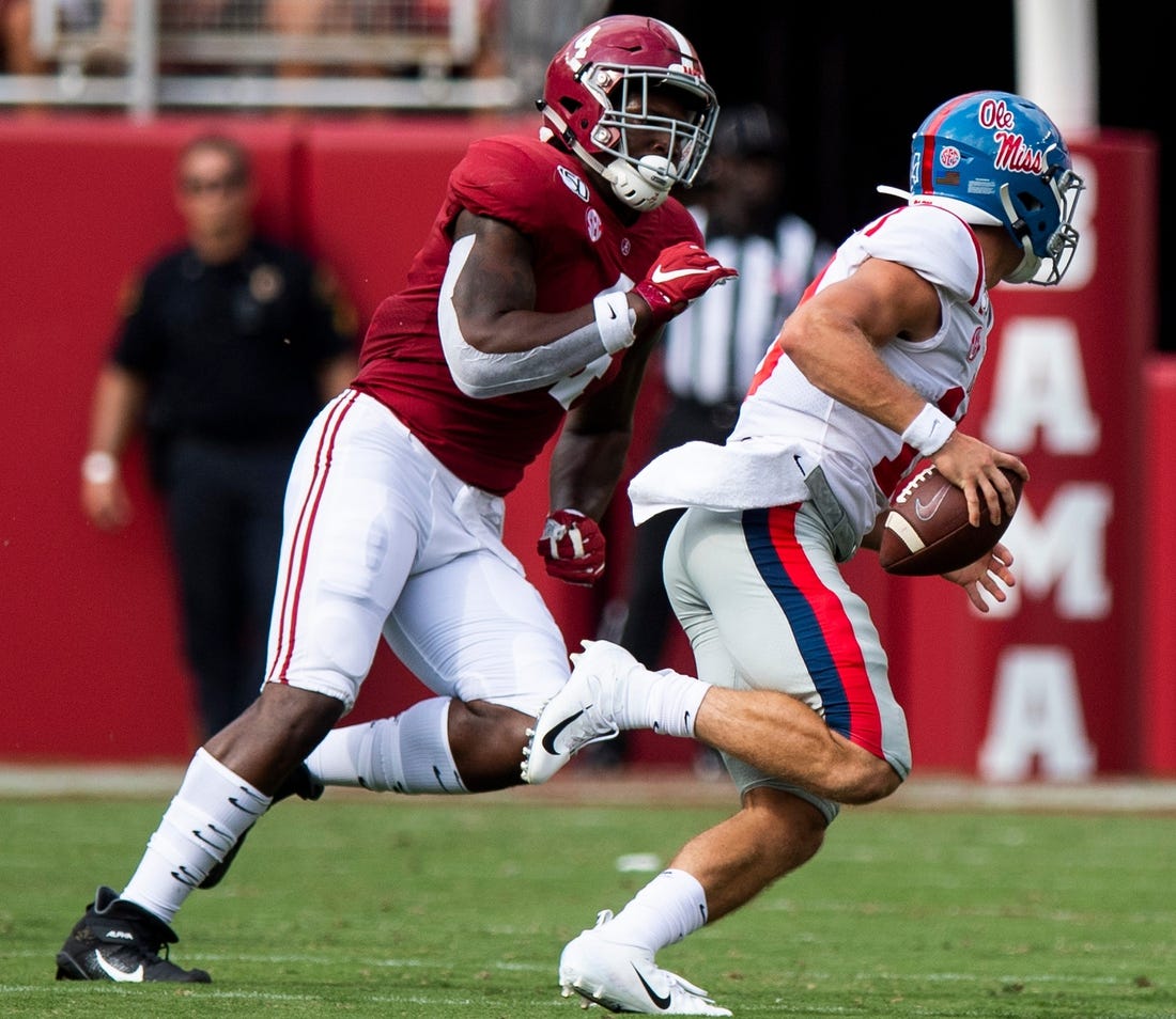 Alabama linebacker Christopher Allen (4) chases Ole Miss quarterback John Rhys Plumlee (10) at Bryant-Denny Stadium in Tuscaloosa, Ala., on Saturday September 28, 2019.

Allen501