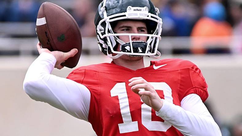 Apr 16, 2022; East Lansing, Michigan, USA;  Michigan State University Spartans quarterback Payton Thorne (10) throws upfield at Spartan Stadium. Mandatory Credit: Dale Young-USA TODAY Sports