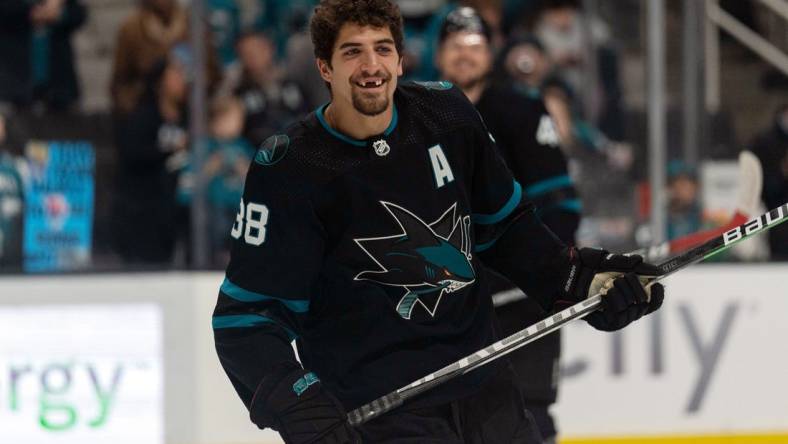 Apr 21, 2022; San Jose, California, USA;  San Jose Sharks defenseman Mario Ferraro (38) smiles during warms ups before the start of the game against the St. Louis Blues at SAP Center at San Jose. Mandatory Credit: Stan Szeto-USA TODAY Sports