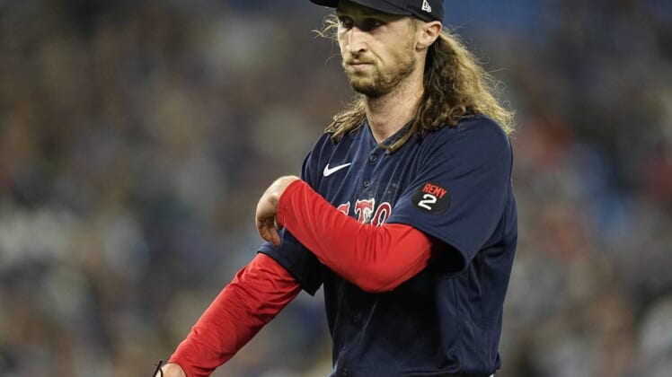 Apr 25, 2022; Toronto, Ontario, CAN; Boston Red Sox pitcher Matt Strahm (55) comes out of the game during the eighth inning against the Toronto Blue Jays at Rogers Centre. Mandatory Credit: John E. Sokolowski-USA TODAY Sports