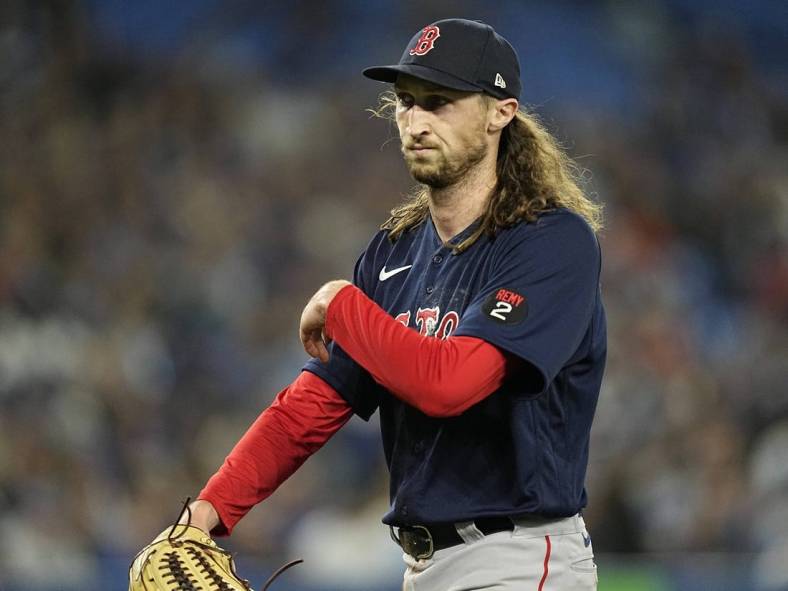 Apr 25, 2022; Toronto, Ontario, CAN; Boston Red Sox pitcher Matt Strahm (55) comes out of the game during the eighth inning against the Toronto Blue Jays at Rogers Centre. Mandatory Credit: John E. Sokolowski-USA TODAY Sports