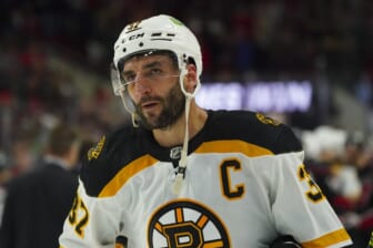 May 14, 2022; Raleigh, North Carolina, USA; Boston Bruins center Patrice Bergeron (37) leaves the ice after the game against the Carolina Hurricanes in game seven of the first round of the 2022 Stanley Cup Playoffs at PNC Arena. Mandatory Credit: James Guillory-USA TODAY Sports