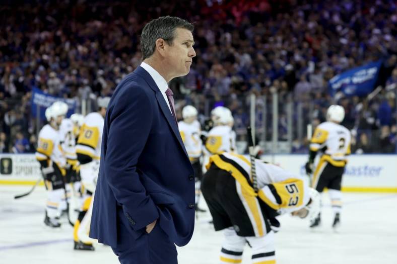 May 15, 2022; New York, New York, USA; Pittsburgh Penguins head coach Mike Sullivan walks off the ice after losing to the New York Rangers 4-3 in overtime of game seven of the first round of the 2022 Stanley Cup Playoffs at Madison Square Garden. Mandatory Credit: Brad Penner-USA TODAY Sports