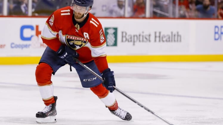 May 19, 2022; Sunrise, Florida, USA; Florida Panthers left wing Jonathan Huberdeau (11) shoots the puck during the second period against the Tampa Bay Lightning in game two of the second round of the 2022 Stanley Cup Playoffs at FLA Live Arena. Mandatory Credit: Sam Navarro-USA TODAY Sports