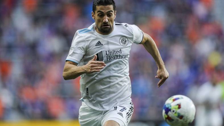 May 21, 2022; Cincinnati, Ohio, USA; New England Revolution midfielder Sebastian Lletget (17) cashes the ball against FC Cincinnati in the first half at TQL Stadium. Mandatory Credit: Katie Stratman-USA TODAY Sports