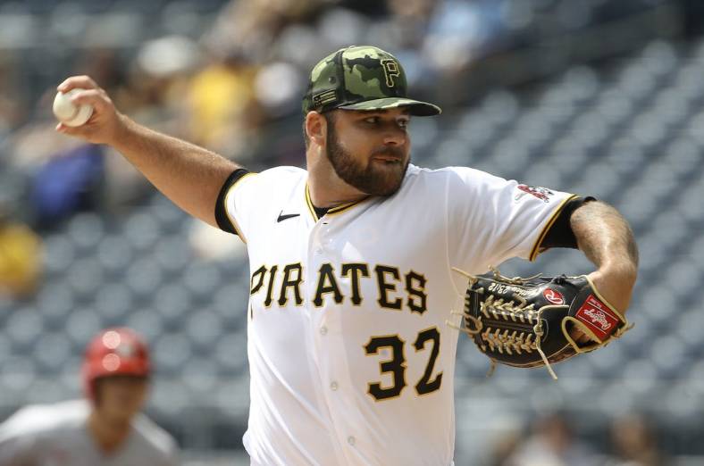 May 22, 2022; Pittsburgh, Pennsylvania, USA;  Pittsburgh Pirates starting pitcher Bryse Wilson (32) delivers a pitch against the St. Louis Cardinals during the first inning at PNC Park. Mandatory Credit: Charles LeClaire-USA TODAY Sports