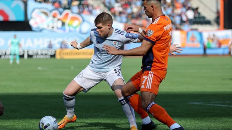 May 22, 2022; New York, NY, New York, NY, USA; Chicago Fire forward Chris Mueller (8) controls the ball against New York City FC midfielder Alfredo Morales (7) during the first half at Citi Field. Mandatory Credit: Brad Penner-USA TODAY Sports