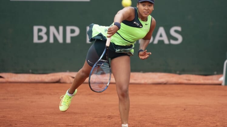 May 23, 2022; Paris, France; Naomi Osaka (JPN) serves the ball during her match against Amanda Anisimova (USA) on day two of the French Open at Stade Roland-Garros. Mandatory Credit: Susan Mullane-USA TODAY Sports