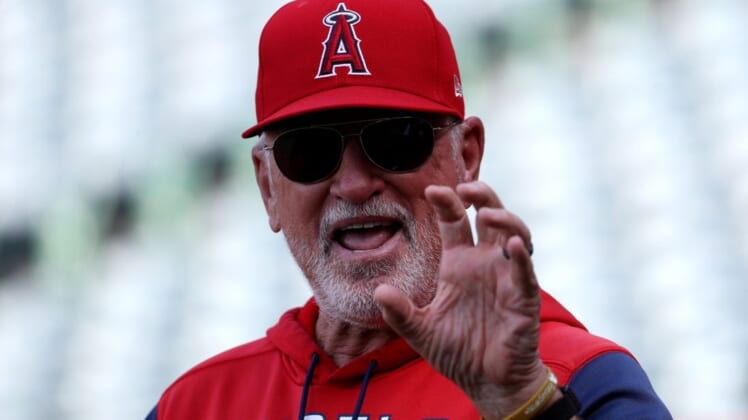 May 25, 2022; Anaheim, California, USA;  Los Angeles Angels manager Joe Maddon (70) on the field before the game against the Texas Rangers at Angel Stadium. Mandatory Credit: Kiyoshi Mio-USA TODAY Sports