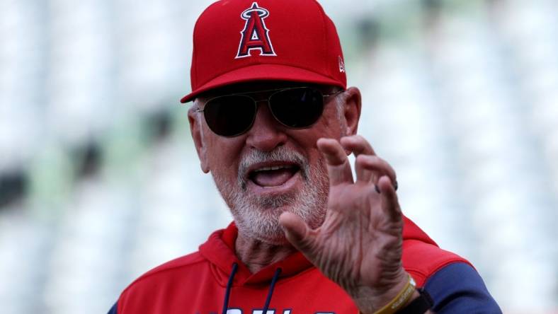 May 25, 2022; Anaheim, California, USA;  Los Angeles Angels manager Joe Maddon (70) on the field before the game against the Texas Rangers at Angel Stadium. Mandatory Credit: Kiyoshi Mio-USA TODAY Sports