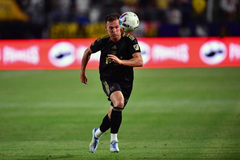 May 25, 2022; Carson, California, USA; Los Angeles FC forward Danny Musovski (29) moves the ball against Los Angeles FC during the first half at Dignity Health Sports Park. Mandatory Credit: Gary A. Vasquez-USA TODAY Sports