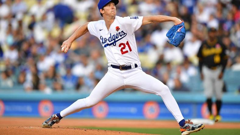 May 30, 2022; Los Angeles, California, USA; Los Angeles Dodgers starting pitcher Walker Buehler (21) throws against the Pittsburgh Pirates during the first inning at Dodger Stadium. Mandatory Credit: Gary A. Vasquez-USA TODAY Sports