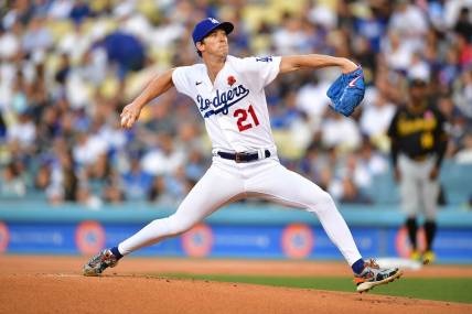 May 30, 2022; Los Angeles, California, USA; Los Angeles Dodgers starting pitcher Walker Buehler (21) throws against the Pittsburgh Pirates during the first inning at Dodger Stadium. Mandatory Credit: Gary A. Vasquez-USA TODAY Sports