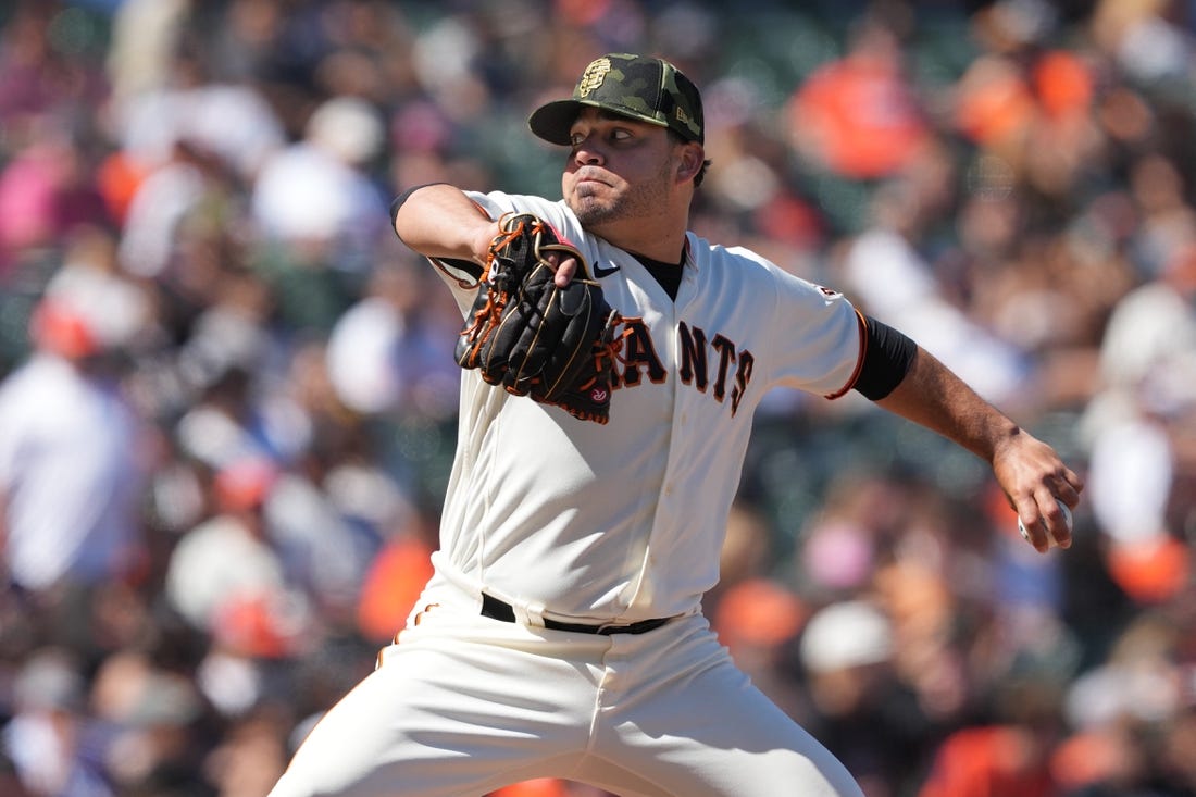 May 21, 2022; San Francisco, California, USA; San Francisco Giants relief pitcher Jose Alvarez (48) throws a pitch against the San Diego Padres during the ninth inning at Oracle Park. Mandatory Credit: Darren Yamashita-USA TODAY Sports