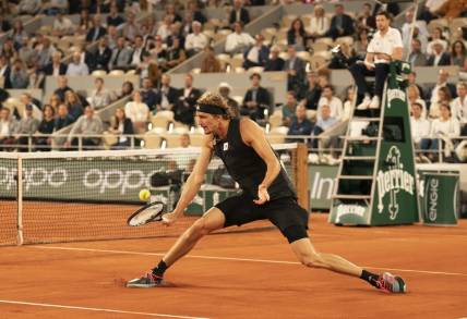 June 3, 2022; Paris, France; Alexander Zverev (GER) returns a shot during his semifinal match against Rafael Nadal (ESP)on day 13 of the French Open at Stade Roland-Garros. Mandatory Credit: Susan Mullane-USA TODAY Sports
