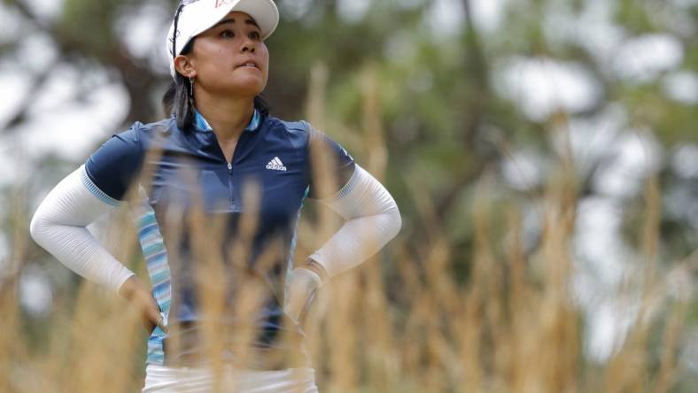 Jun 3, 2022; Southern Pines, North Carolina, USA; Danielle Kang reacts after hitting a tee shot on the fifth hole during the second round of the U.S. Women's Open. Mandatory Credit: Geoff Burke-USA TODAY Sports