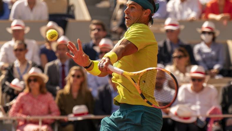 June 5, 2022; Paris, France; Rafael Nadal (ESP) returns a shot during the men s singles final against Casper Ruud (NOR) on day 15 of the French Open at Stade Roland-Garros. Mandatory Credit: Susan Mullane-USA TODAY Sports