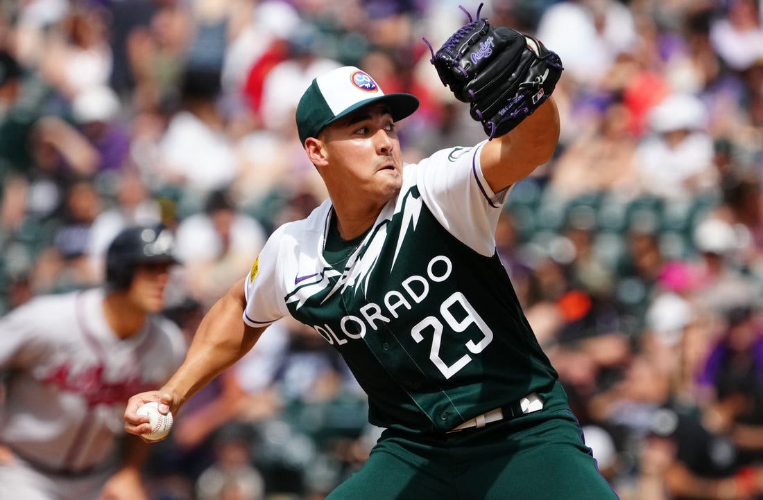 Jun 5, 2022; Denver, Colorado, USA; Colorado Rockies relief pitcher Robert Stephenson (29) delivers a pitch in the seventh against the Atlanta Braves at Coors Field. Mandatory Credit: Ron Chenoy-USA TODAY Sports