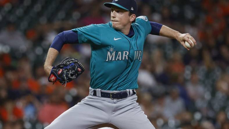 Jun 7, 2022; Houston, Texas, USA; Seattle Mariners relief pitcher Ryan Borucki (30) delivers a pitch during the eighth inning against the Houston Astros at Minute Maid Park. Mandatory Credit: Troy Taormina-USA TODAY Sports