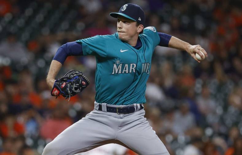 Jun 7, 2022; Houston, Texas, USA; Seattle Mariners relief pitcher Ryan Borucki (30) delivers a pitch during the eighth inning against the Houston Astros at Minute Maid Park. Mandatory Credit: Troy Taormina-USA TODAY Sports