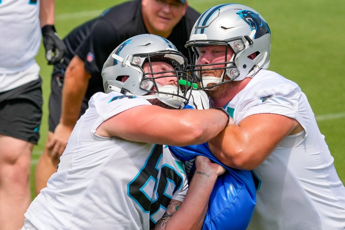 Jun 8, 2022; Charlotte, North Carolina, USA; Carolina Panthers center Sam Tecklenburg (68) drills with center Bradley Bozeman (56) during Carolina Panthers minicamp at Bank of America Stadium Practice Facility. Mandatory Credit: Jim Dedmon-USA TODAY Sports