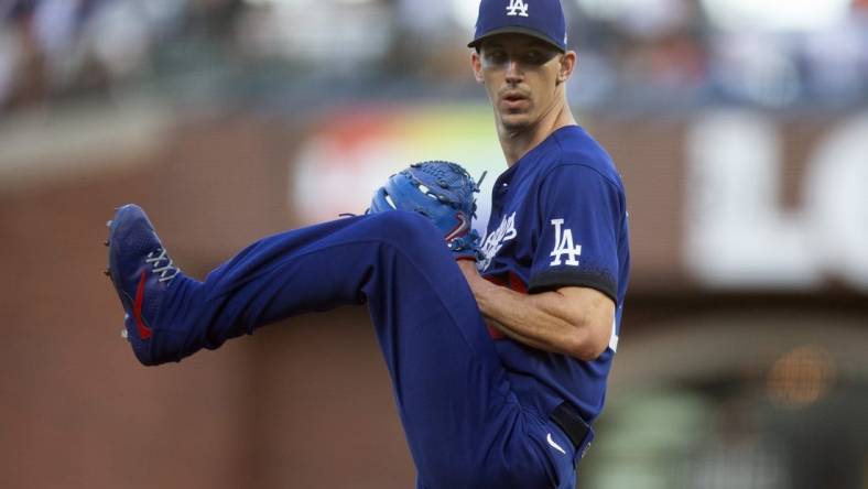 Jun 10, 2022; San Francisco, California, USA; Los Angeles Dodgers starting pitcher Walker Buehler (21) delivers a pitch against the San Francisco Giants during the second inning at Oracle Park. Mandatory Credit: D. Ross Cameron-USA TODAY Sports