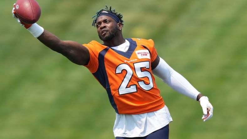 Jun 13, 2022; Englewood, CO, USA; Denver Broncos running back Melvin Gordon (25) during mini camp drills at the UCHealth Training Center. Mandatory Credit: Ron Chenoy-USA TODAY Sports