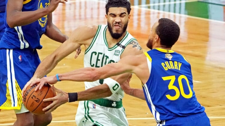 Jun 16, 2022; Boston, Massachusetts, USA; Boston Celtics forward Jayson Tatum (0) drives to the basket against Golden State Warriors guard Stephen Curry (30) during the third quarter in game six of the 2022 NBA Finals at TD Garden. Mandatory Credit: Kyle Terada-USA TODAY Sports