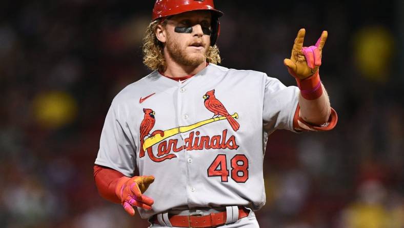 Jun 17, 2022; Boston, Massachusetts, USA; St. Louis Cardinals center fielder Harrison Bader (48) reacts after hitting a RBI triple against the Boston Red Sox during the ninth inning at Fenway Park. Mandatory Credit: Brian Fluharty-USA TODAY Sports