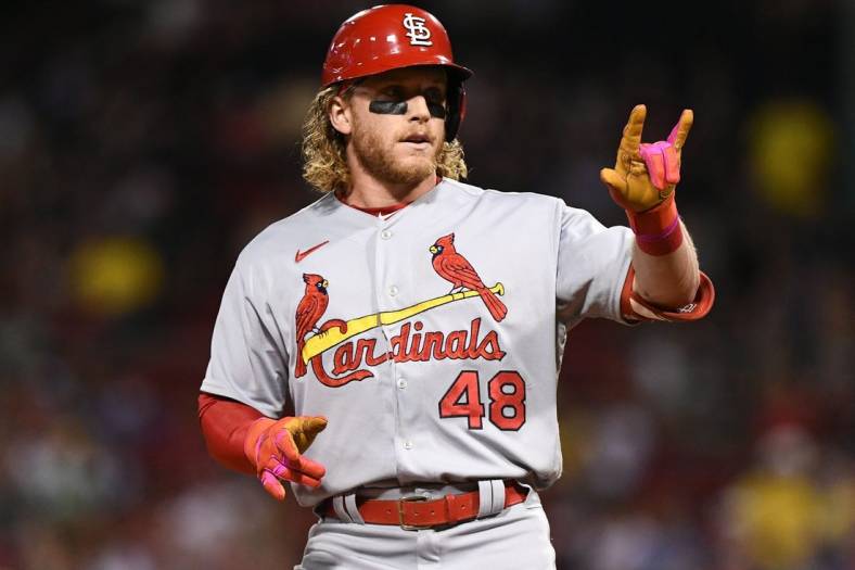 Jun 17, 2022; Boston, Massachusetts, USA; St. Louis Cardinals center fielder Harrison Bader (48) reacts after hitting a RBI triple against the Boston Red Sox during the ninth inning at Fenway Park. Mandatory Credit: Brian Fluharty-USA TODAY Sports