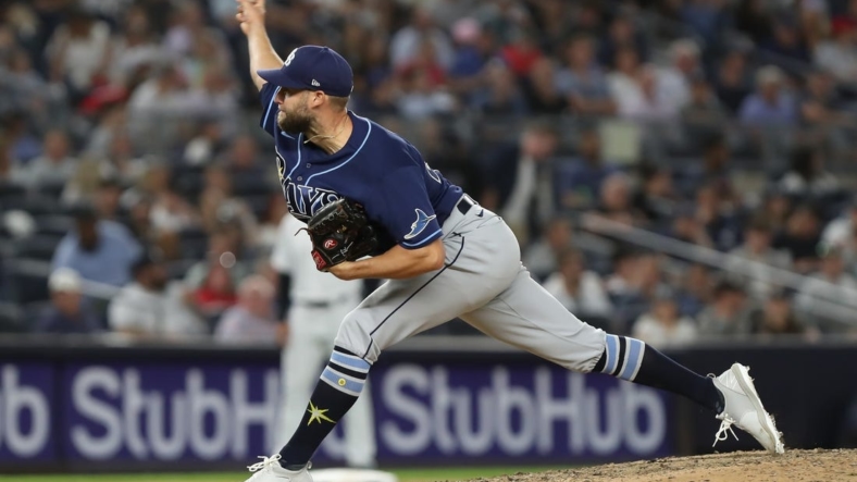 Jun 14, 2022; Bronx, New York, USA; Tampa Bay Rays relief pitcher Luke Bard (46) pitches the ball against the New York Yankees during the seventh inning at Yankee Stadium. Mandatory Credit: Tom Horak-USA TODAY Sports