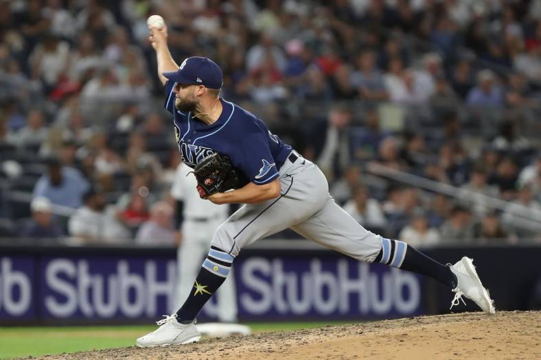 Jun 14, 2022; Bronx, New York, USA; Tampa Bay Rays relief pitcher Luke Bard (46) pitches the ball against the New York Yankees during the seventh inning at Yankee Stadium. Mandatory Credit: Tom Horak-USA TODAY Sports