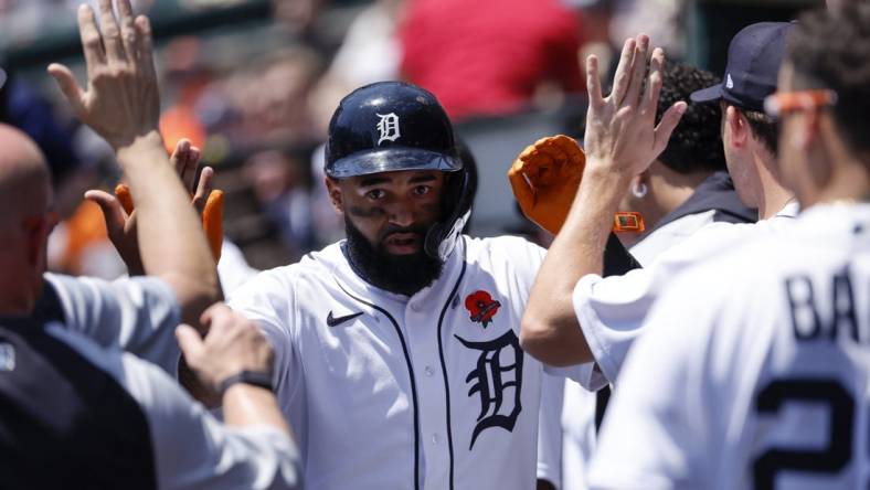 May 30, 2022; Detroit, Michigan, USA;  Detroit Tigers center fielder Derek Hill (54) receives congratulations from teammates after he hits a home run in the third inning against the Minnesota Twins at Comerica Park. Mandatory Credit: Rick Osentoski-USA TODAY Sports