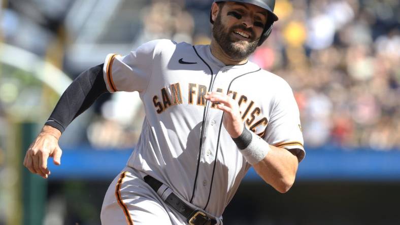 Jun 18, 2022; Pittsburgh, Pennsylvania, USA;  San Francisco Giants catcher Curt Casali (2) runs the bases on his way to scoring a run against the Pittsburgh Pirates during the third inning at PNC Park. Mandatory Credit: Charles LeClaire-USA TODAY Sports